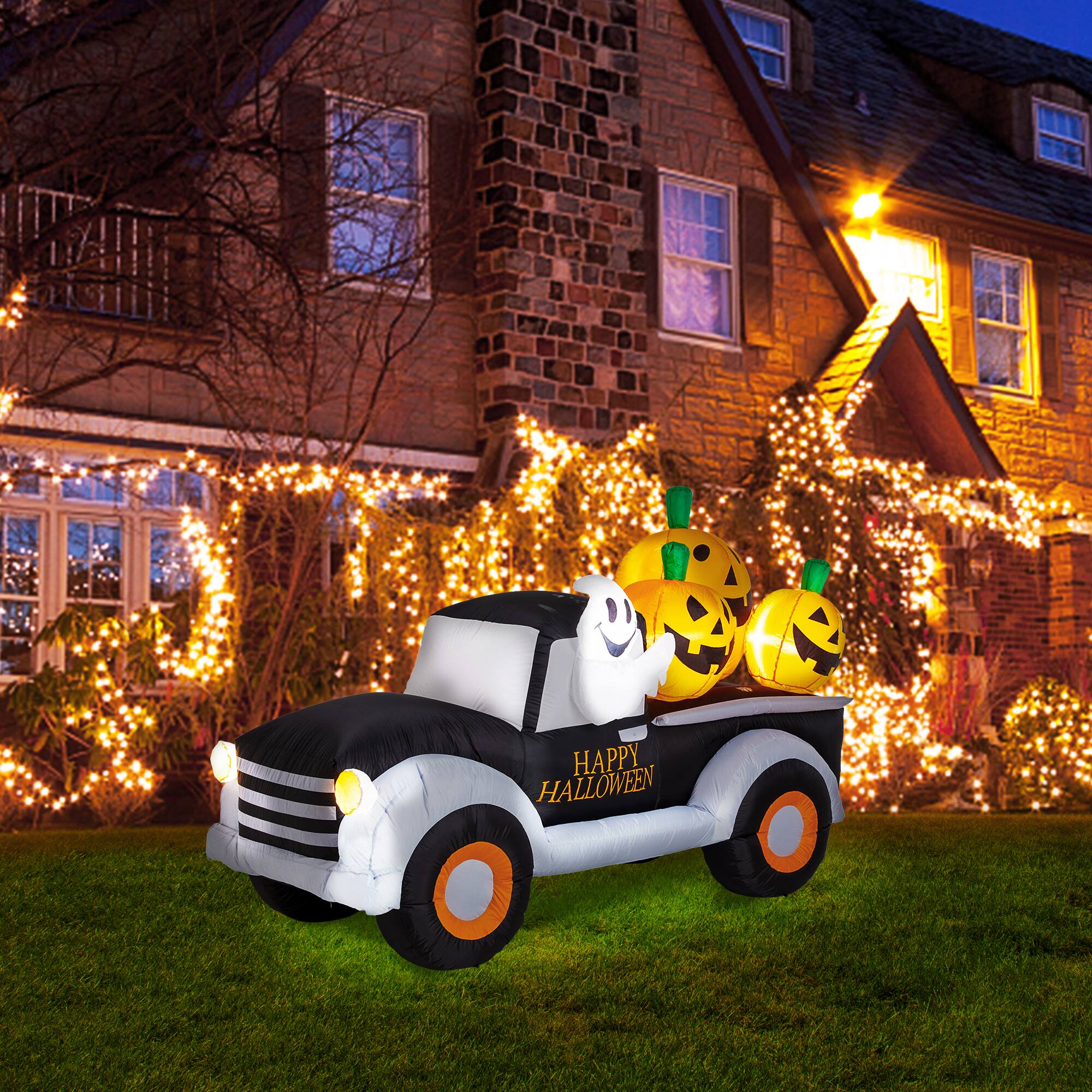Glitzhome® 8ft. Lighted Inflatable Truck With Jack-O-Lantern Pumpkins Décor